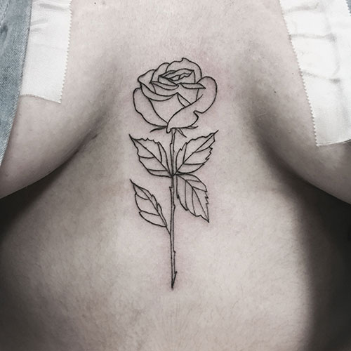 Rose Outline Chest Tattoo