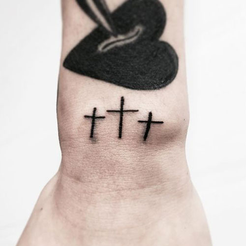 Simple Cross Tattoo on Wrist