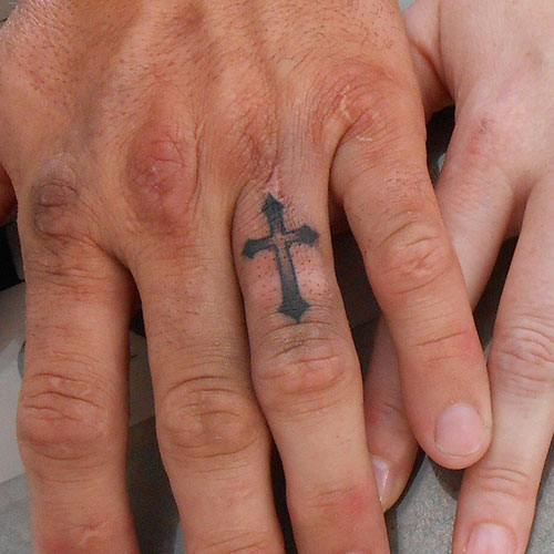 Cross Tattoo on Ring Finger