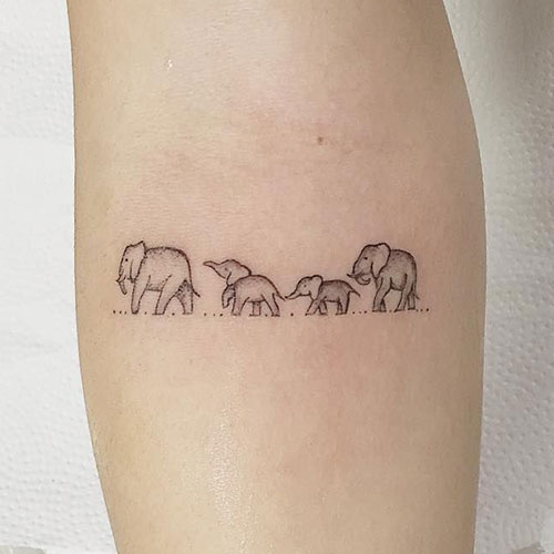 Line of Elephants Tattoo