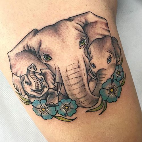 Elephant Family Tattoo with Flower Designs