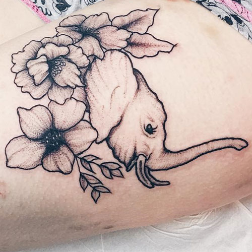 Cute Elephant Flower Tattoo Designs on Thigh