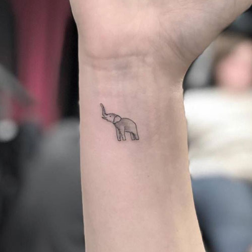Cute Tiny Elephant Wrist Tattoo