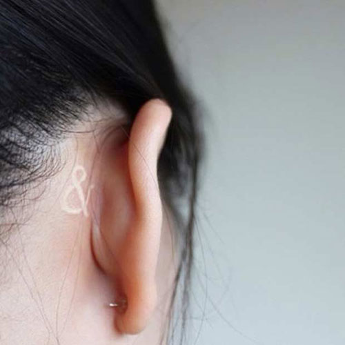 Behind Ear White Ink Tattoo