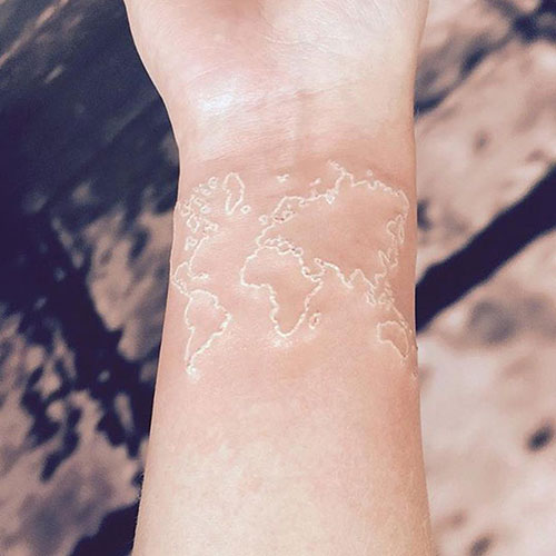 World Map White Ink Tattoo