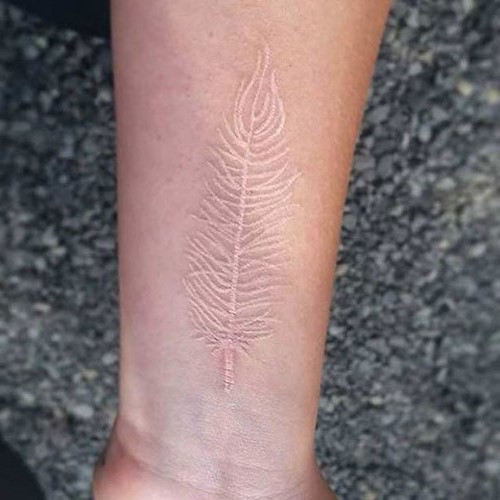 White Ink Feather Tattoo