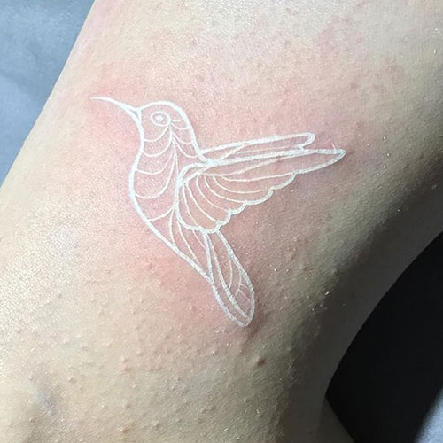 Cute White Ink Bird Tattoo
