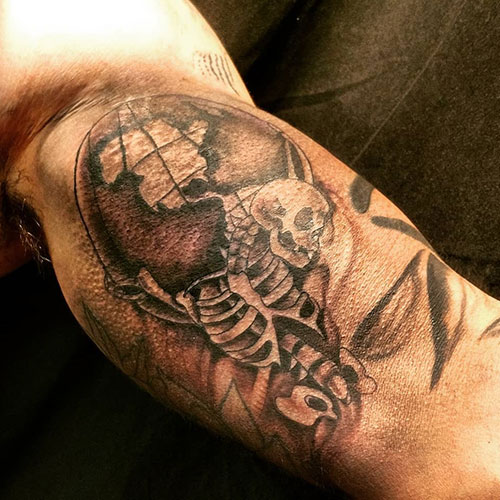 Cool Inner Bicep Skull Tattoos