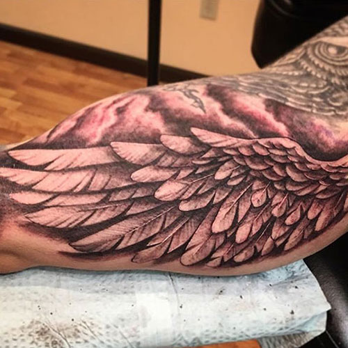 Inner Bicep Wing Tattoo