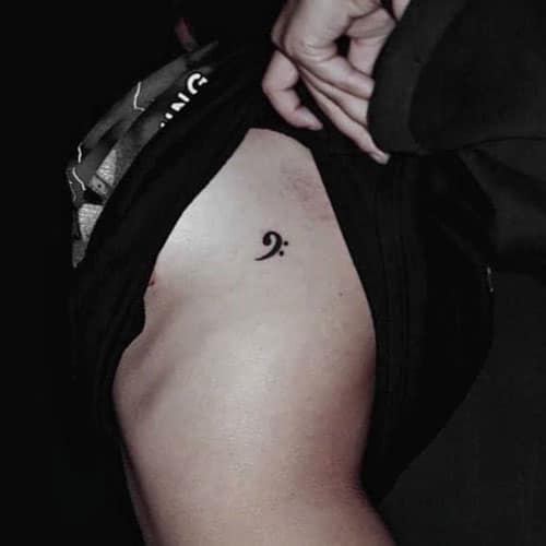 Small Musical Note Tattoo