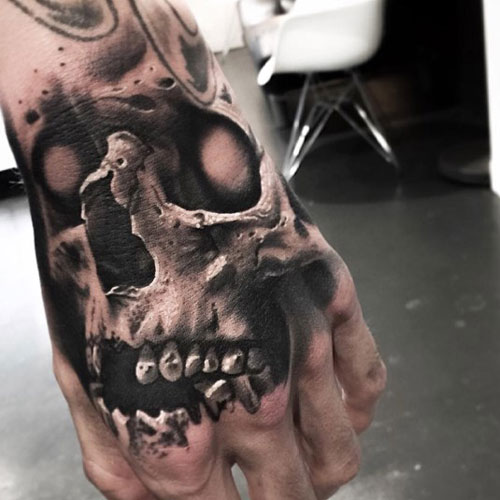 Badass Skull Hand Tattoo Designs
