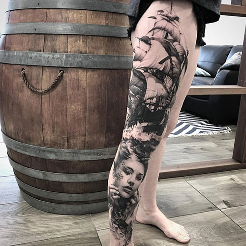 Badass Thigh Tattoo Designs For Females