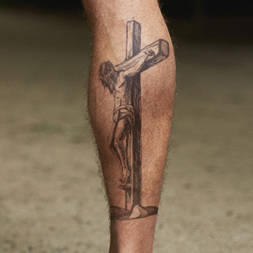 Cross Tattoo on Calf