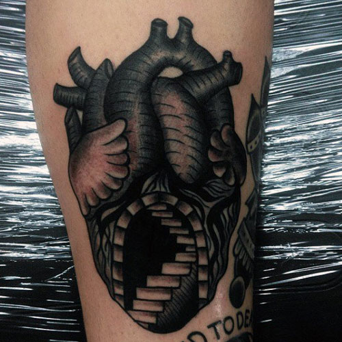 Badass Black Heart Tattoo on Arm