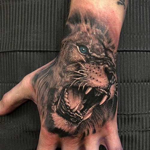 Cool Lion Hand Tattoo
