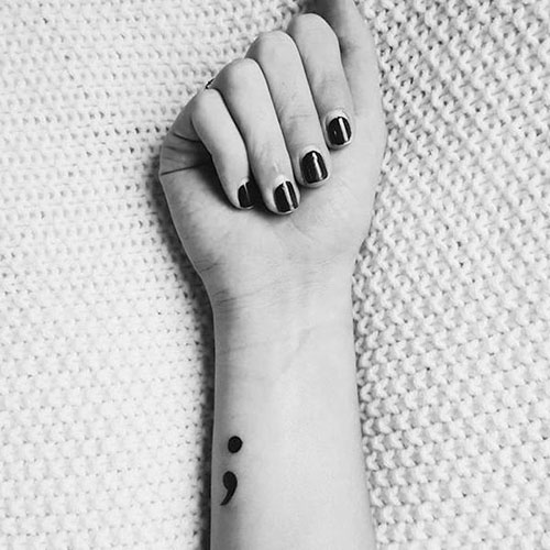 Simple Small Black Semicolon Tattoo on Wrist