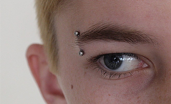 Eyebrow piercing designs23